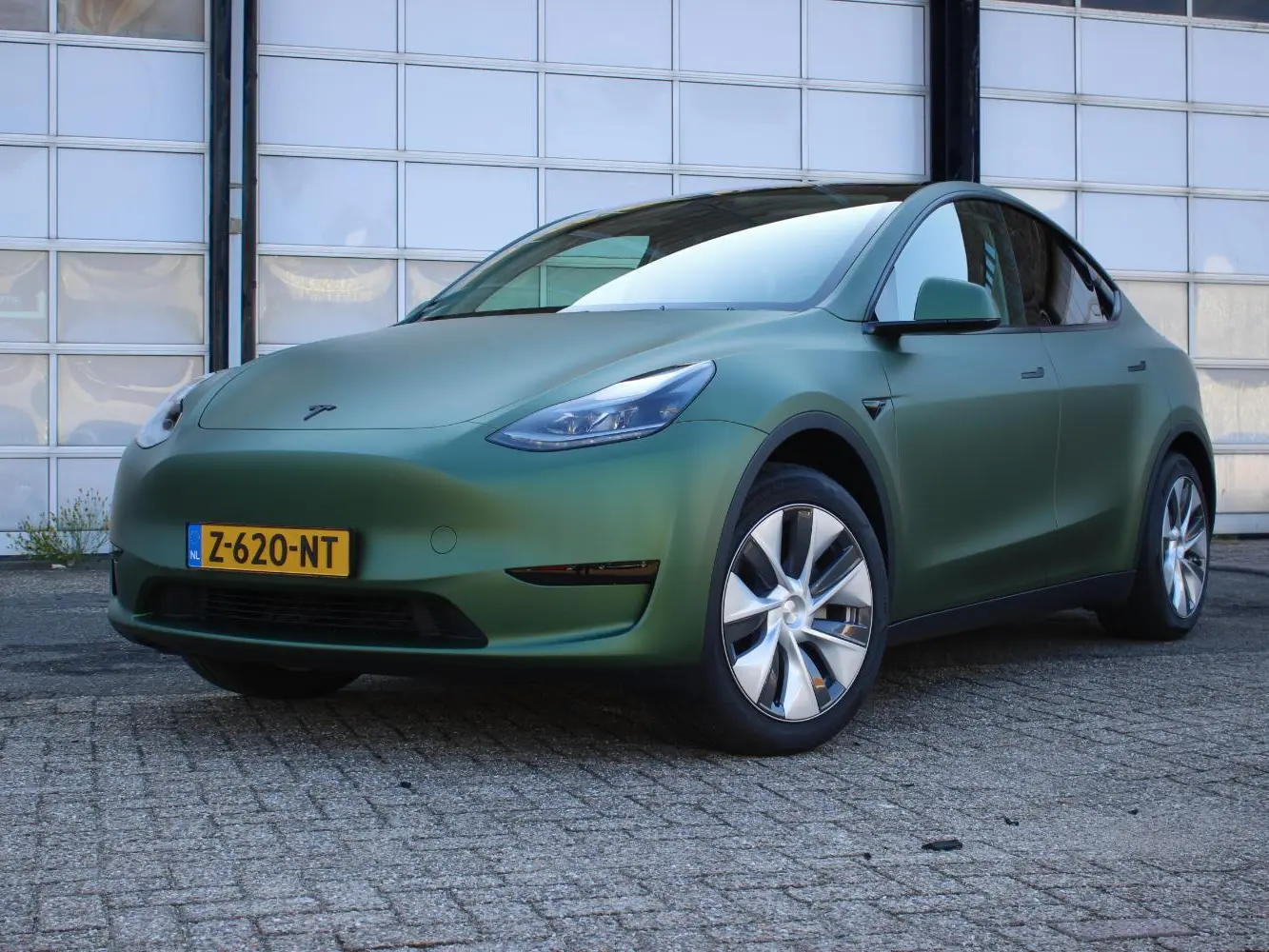 Tesla Model Y Wrapped in Matte Green Metallic